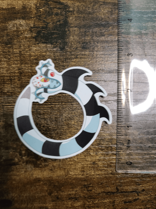 Saturnian Sandworm Sticker